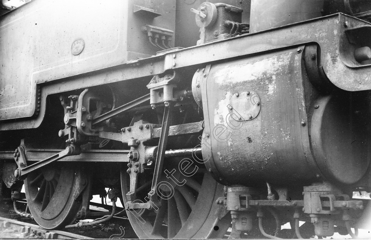 WD0600 
 ENGINE CLASS: Moguls 2-6-0 ENGINE NUMBER: 2703 LOCATION: Coppull DATE: 02 July 1938 COMMENTS: 
 Keywords: 02 July 1938, 2703, Cooperline, Coppull, Moguls 2-6-0, Steam, WD Cooper, locomotives, railway photography, trains