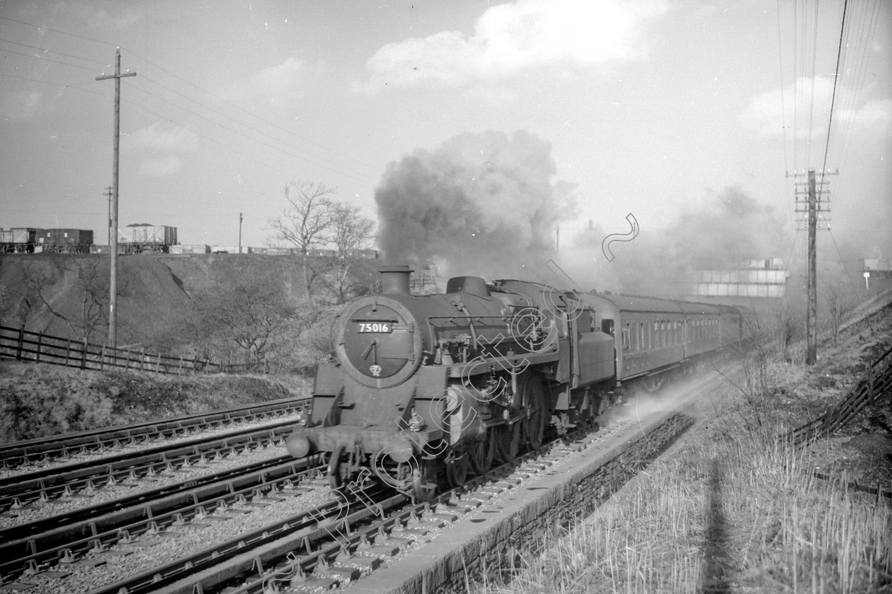 WD2470 
 ENGINE CLASS: BR 75000 4-6-0 ENGINE NUMBER: 75016 LOCATION: Walkden Troughs DATE: 13 April 1960 COMMENTS: 
 Keywords: 13 April 1960, 75016, BR 75000 4-6-0, Cooperline, Steam, WD Cooper, Walkden Troughs, locomotives, railway photography, trains