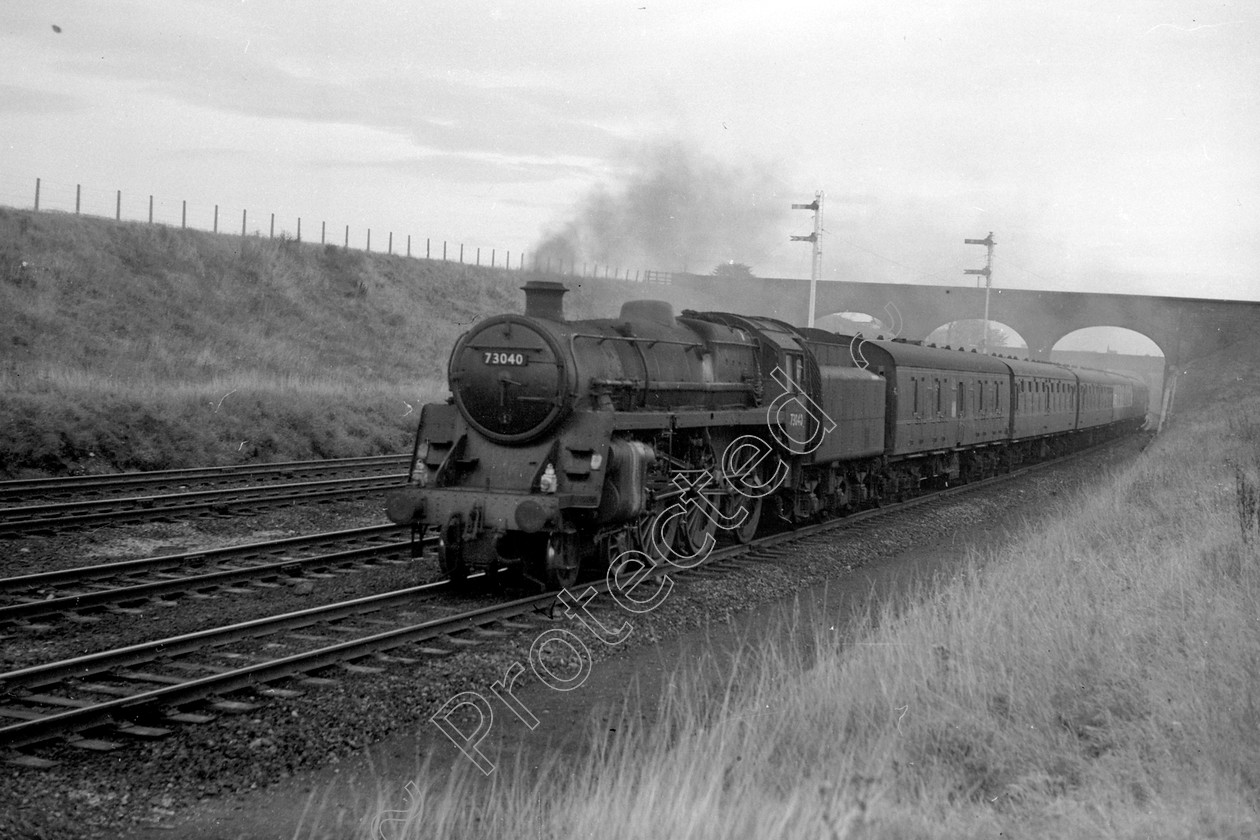 WD2416 
 ENGINE CLASS: BR 73000 4-6-0 ENGINE NUMBER: 73040 LOCATION: Near Chester DATE: 19 October 1963 COMMENTS: 
 Keywords: 19 October 1963, 73040, BR 73000 4-6-0, Cooperline, Near Chester, Steam, WD Cooper, locomotives, railway photography, trains