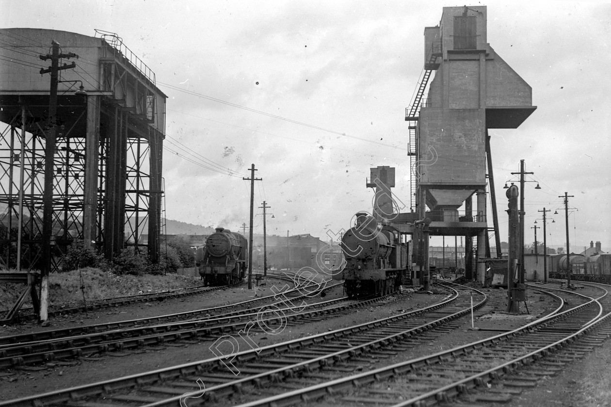 WD2767 
 ENGINE CLASS: Motive Power depots and cranes ENGINE NUMBER: LOCATION: Carnforth DATE: 00.05.1949 COMMENTS: 
 Keywords: 00.05.1949, Carnforth, Cooperline, Motive Power depots and cranes, Steam, WD Cooper, locomotives, railway photography, trains