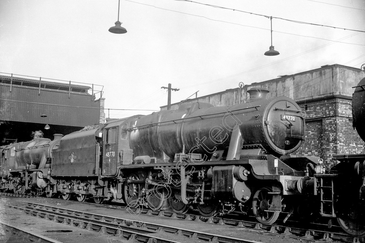 WD2081 
 ENGINE CLASS: Stanier Class 8 2-8-0 ENGINE NUMBER: 48770 LOCATION: Patricroft DATE: 09 November 1963 COMMENTS: 
 Keywords: 09 November 1963, 48770, Cooperline, Patricroft, Stanier Class 8 2-8-0, Steam, WD Cooper, locomotives, railway photography, trains