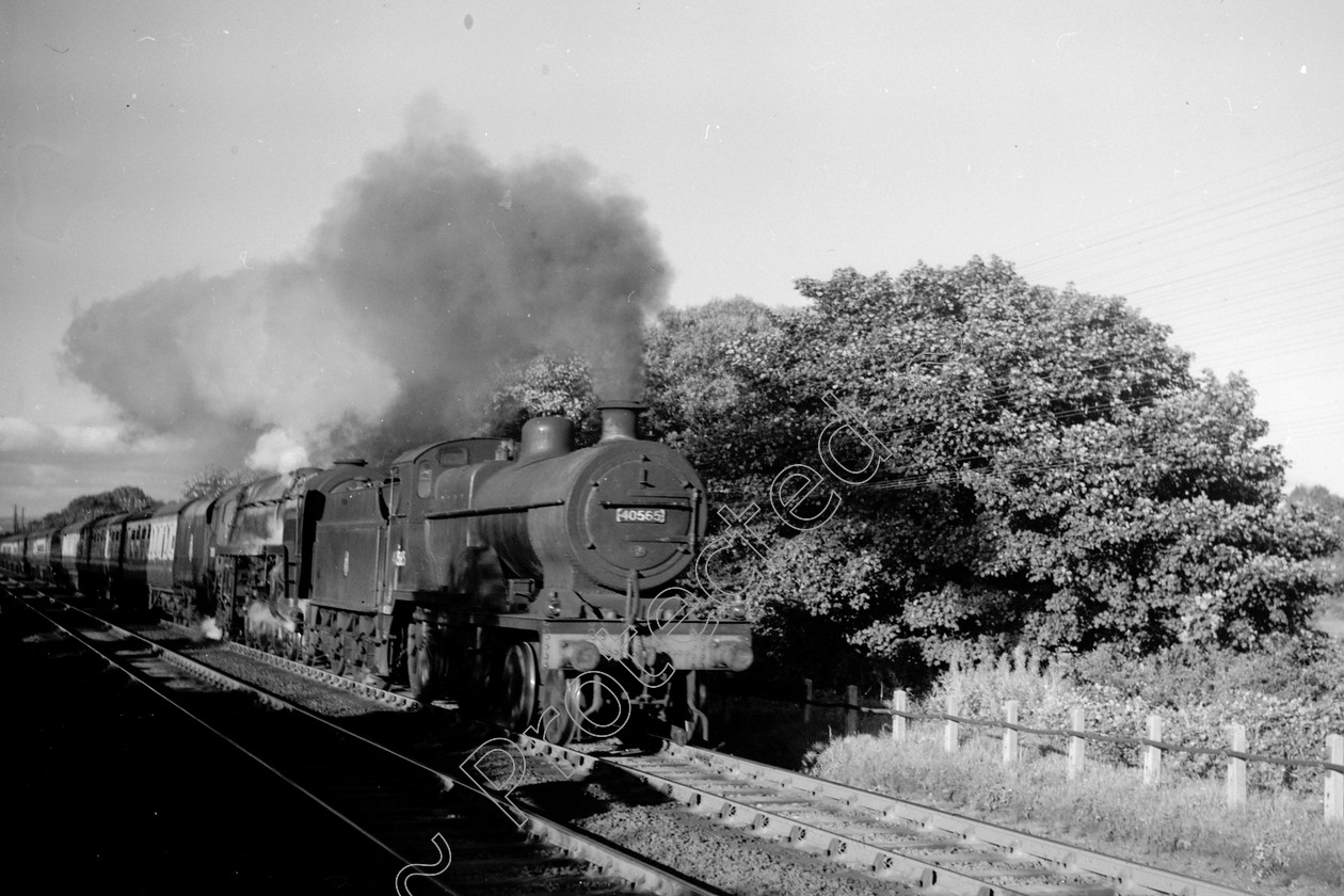 WD0566 
 ENGINE CLASS: Class 2 4-4-0 ENGINE NUMBER: 40565 LOCATION: Bolton-le-Sands DATE: COMMENTS: 
 Keywords: 40565, Bolton-le-Sands, Class 2 4-4-0, Cooperline, Steam, WD Cooper, locomotives, railway photography, trains