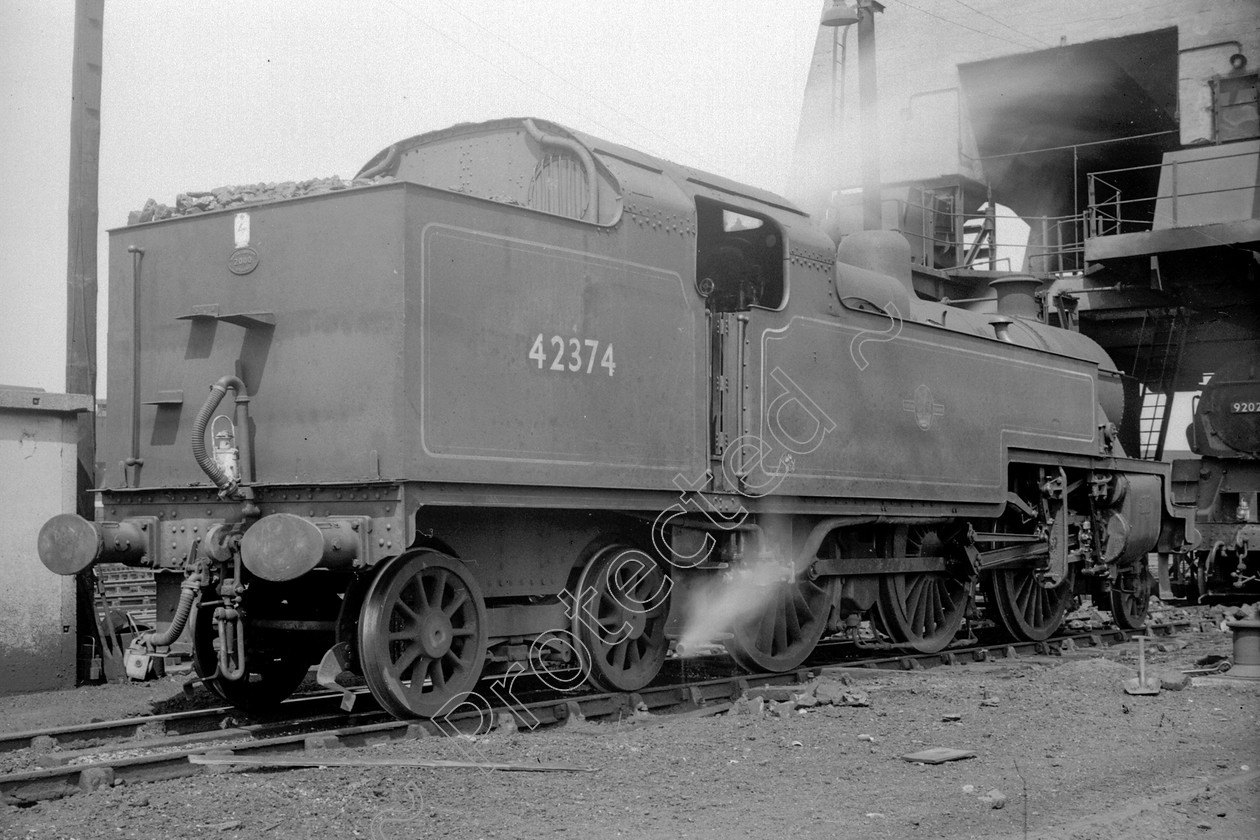 WD1040 
 ENGINE CLASS: 2-6-4 Tanks ENGINE NUMBER: 42374 LOCATION: Patricroft DATE: 04 July 1964 COMMENTS: 
 Keywords: 04 July 1964, 2-6-4 Tanks, 42374, Cooperline, Patricroft, Steam, WD Cooper, locomotives, railway photography, trains