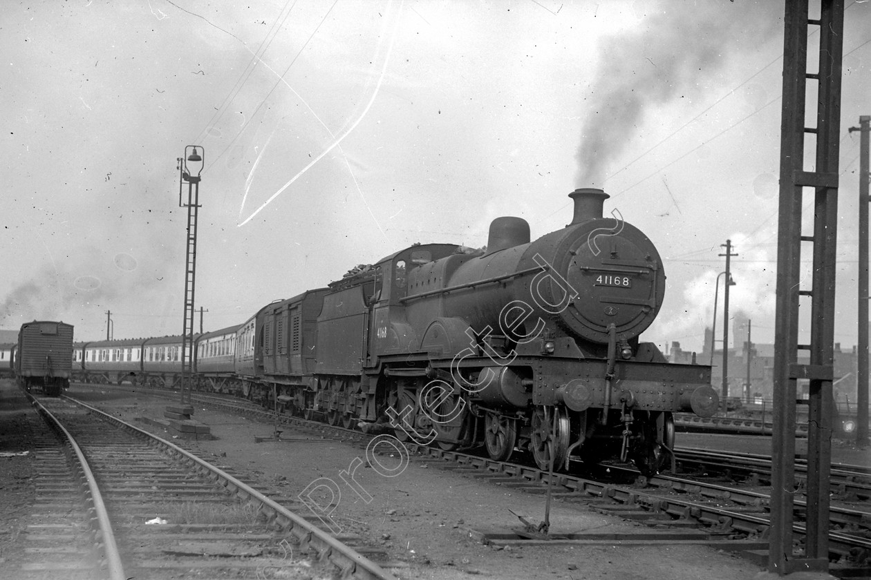 WD0545 
 ENGINE CLASS: Midland Compounds ENGINE NUMBER: 41168 LOCATION: Longsight DATE: 10 October 1951 COMMENTS: 
 Keywords: 10 October 1951, 41168, Cooperline, Longsight, Midland Compounds, Steam, WD Cooper, locomotives, railway photography, trains