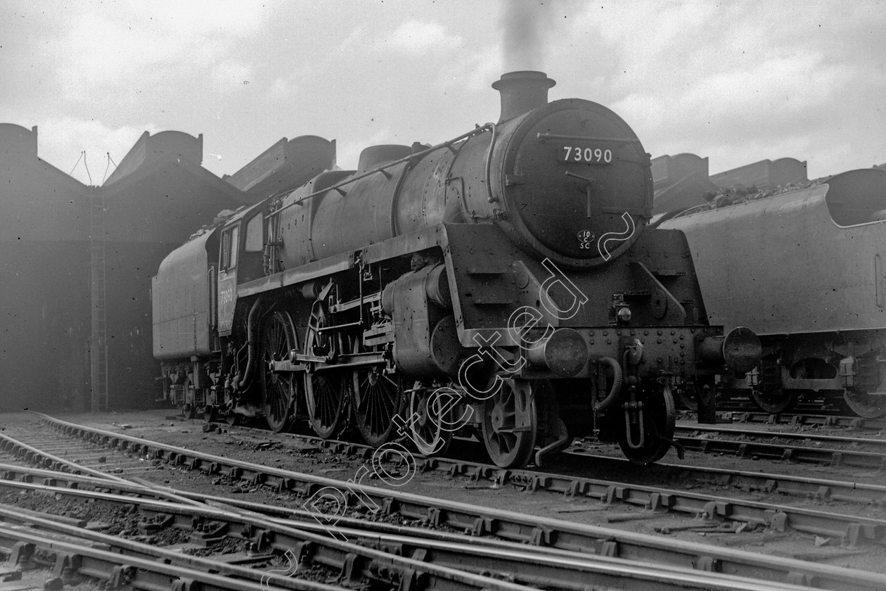 WD2423 
 ENGINE CLASS: BR 73000 4-6-0 ENGINE NUMBER: 73090 LOCATION: Patricroft DATE: 00.07.1956 COMMENTS: 
 Keywords: 00.07.1956, 73090, BR 73000 4-6-0, Cooperline, Patricroft, Steam, WD Cooper, locomotives, railway photography, trains