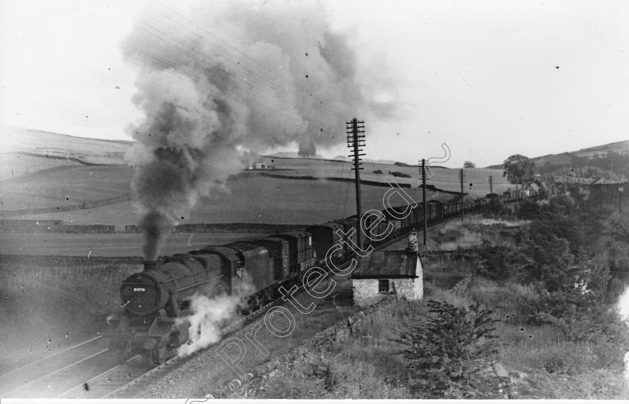 WD2005 
 ENGINE CLASS: Stanier Class 8 2-8-0 ENGINE NUMBER: 48070 LOCATION: Helwith Bridge DATE: 00.08.1949 COMMENTS: 
 Keywords: 00.08.1949, 48070, Cooperline, Helwith Bridge, Stanier Class 8 2-8-0, Steam, WD Cooper, locomotives, railway photography, trains