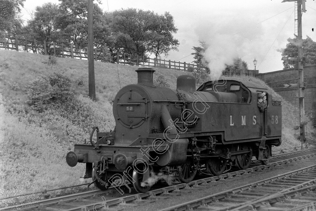 WD0989 
 ENGINE CLASS: MISC ENGINE NUMBER: 58 LOCATION: DATE: 11 June 1947 COMMENTS: 
 Keywords: 11 June 1947, 58, Cooperline, MISC, Steam, WD Cooper, locomotives, railway photography, trains