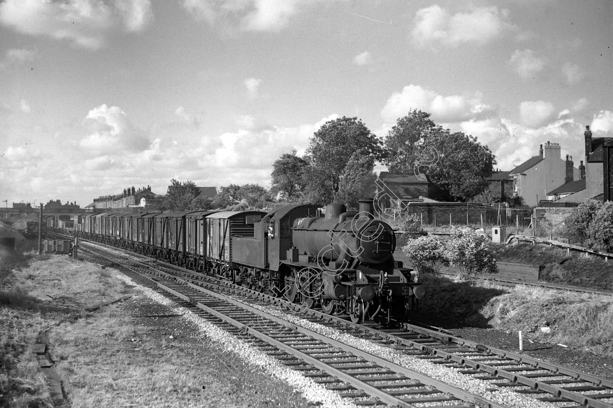 WD0873 
 ENGINE CLASS: Ivatt 6400 & 3000 ENGINE NUMBER: 46432 LOCATION: Golborne DATE: 03 August 1966 COMMENTS: 
 Keywords: 03 August 1966, 46432, Cooperline, Golborne, Ivatt 6400 & 3000, Steam, WD Cooper, locomotives, railway photography, trains