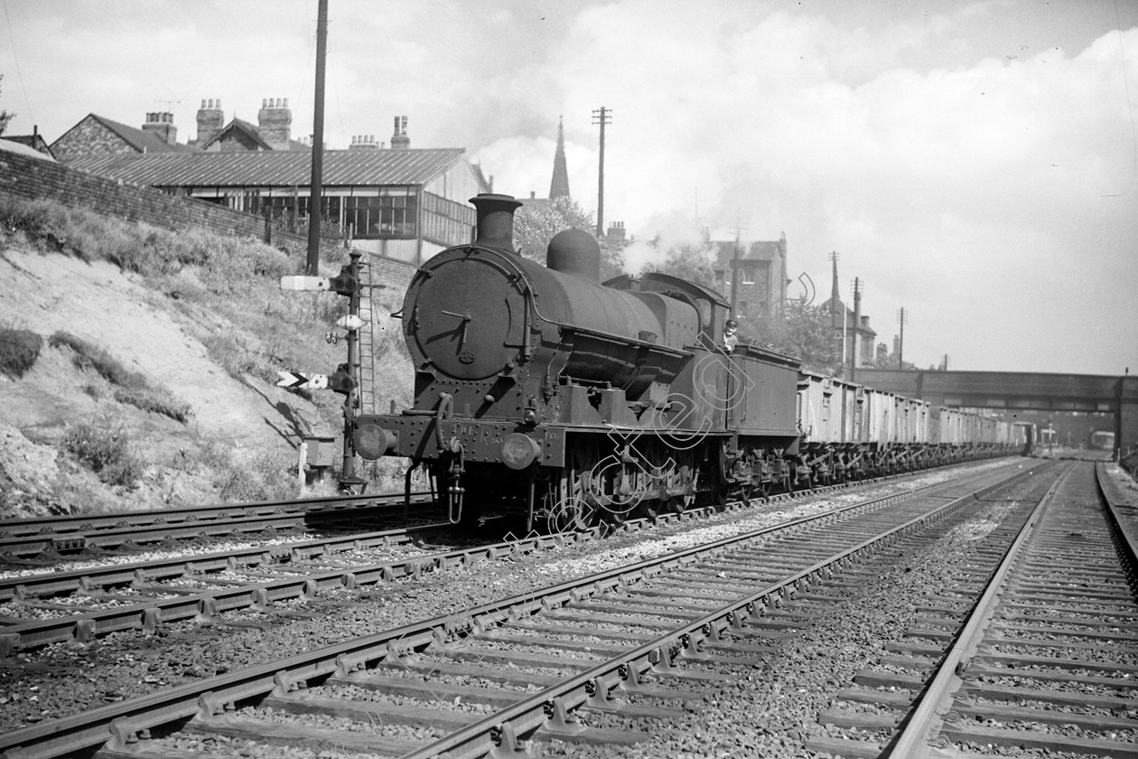 WD0953 
 ENGINE CLASS: L.N.W.R. ENGINE NUMBER: 49119 LOCATION: Eccles DATE: 14 August 1959 COMMENTS: 
 Keywords: 14 August 1959, 49119, Cooperline, Eccles, L.N.W.R., Steam, WD Cooper, locomotives, railway photography, trains