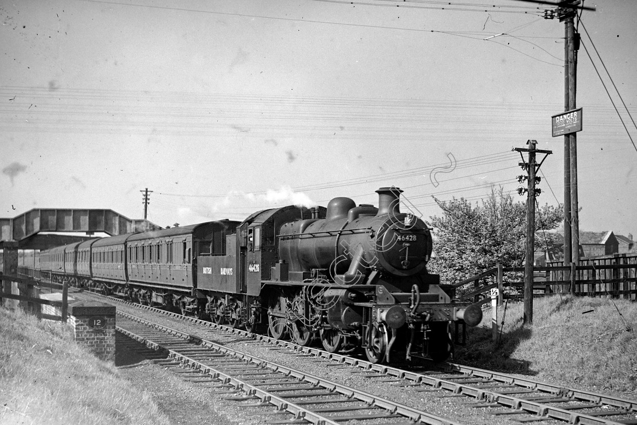 WD0872 
 ENGINE CLASS: Ivatt 6400 & 3000 ENGINE NUMBER: 46428 LOCATION: Kenyon DATE: 03 May 1949 COMMENTS: 
 Keywords: 03 May 1949, 46428, Cooperline, Ivatt 6400 & 3000, Kenyon, Steam, WD Cooper, locomotives, railway photography, trains