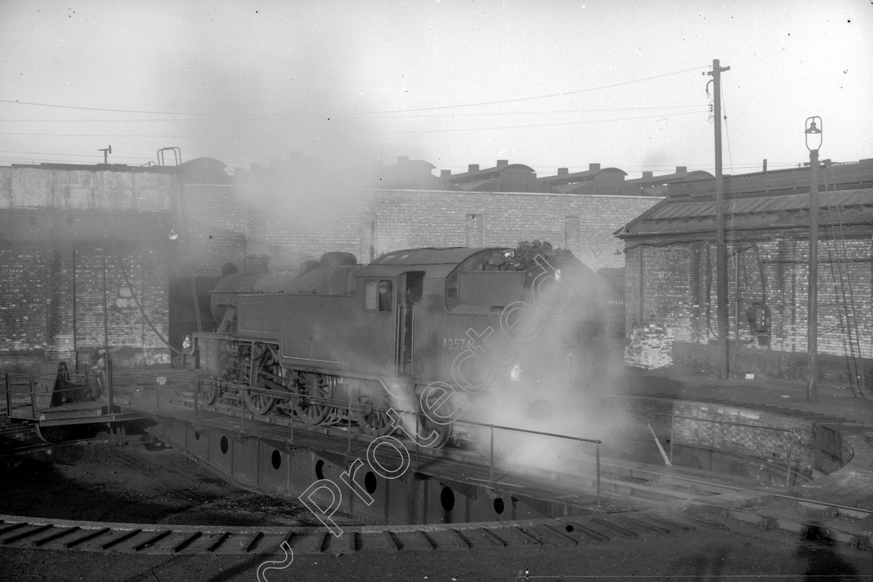 WD1069 
 ENGINE CLASS: 2-6-4 Tanks ENGINE NUMBER: 42574 LOCATION: Patricroft DATE: 10 December 1962 COMMENTS: 
 Keywords: 10 December 1962, 2-6-4 Tanks, 42574, Cooperline, Patricroft, Steam, WD Cooper, locomotives, railway photography, trains