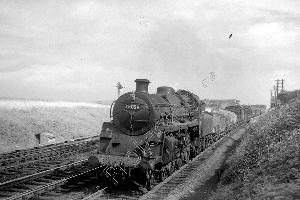 WD2495 
 ENGINE CLASS: BR 75000 4-6-0 ENGINE NUMBER: 75059 LOCATION: Hest Bank DATE: 25 August 1964 COMMENTS: 
 Keywords: 25 August 1964, 75059, BR 75000 4-6-0, Cooperline, Hest bank, Steam, WD Cooper, locomotives, railway photography, trains