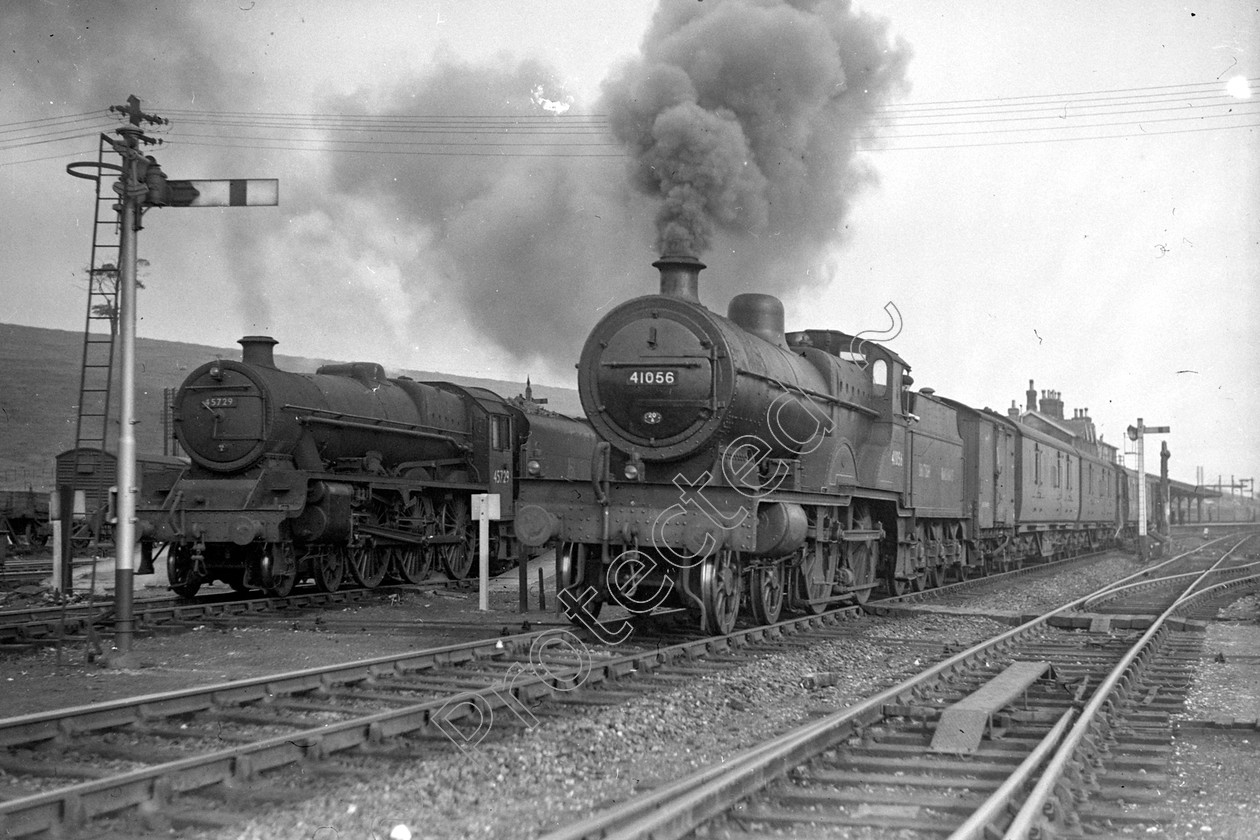 WD0526 
 ENGINE CLASS: Midland Compounds ENGINE NUMBER: 1056 LOCATION: Hellifield DATE: 00.07.1952 COMMENTS: 
 Keywords: 00.07.1952, 1056, Cooperline, Hellifield, Midland Compounds, Steam, WD Cooper, locomotives, railway photography, trains