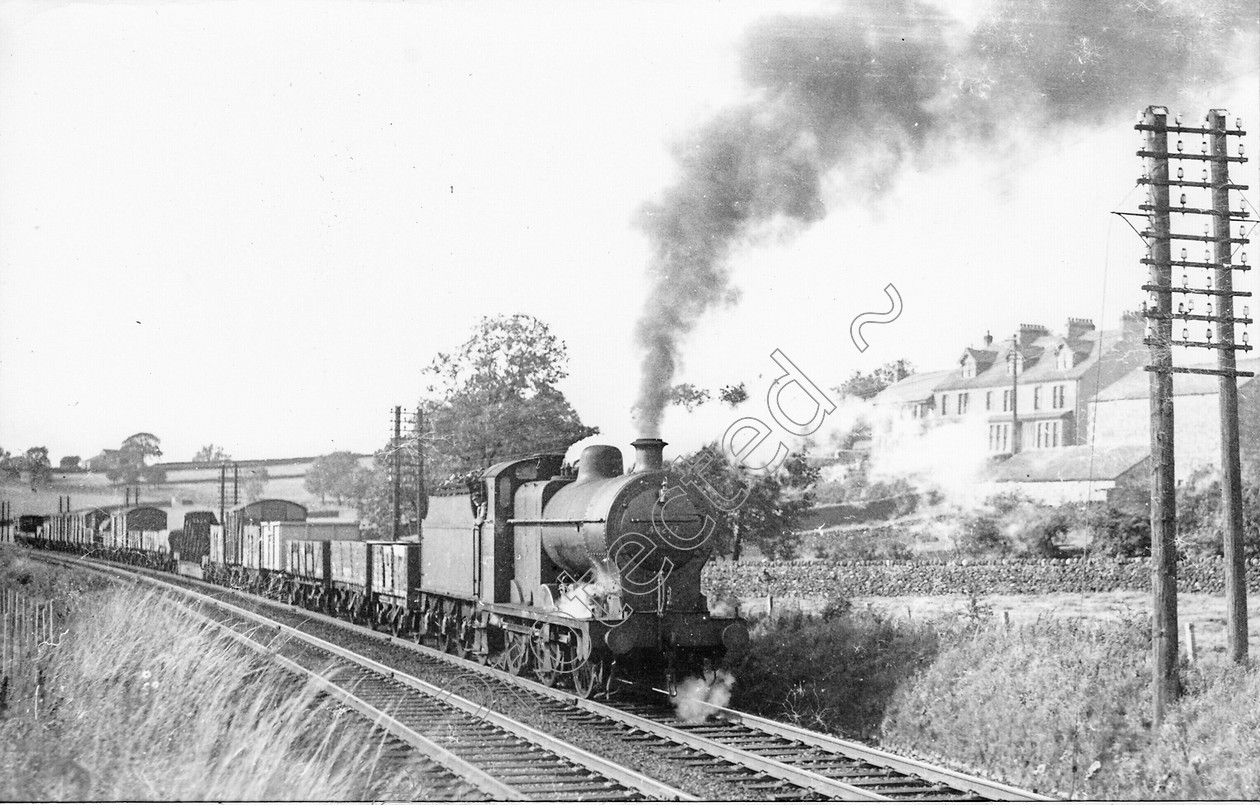 WD0722 
 ENGINE CLASS: Class 4 0-6-0 ENGINE NUMBER: 44277 LOCATION: Long Preston DATE: 00.07.1952 COMMENTS: 
 Keywords: 00.07.1952, 44277, Class 4 0-6-0, Cooperline, Long Preston, Steam, WD Cooper, locomotives, railway photography, trains