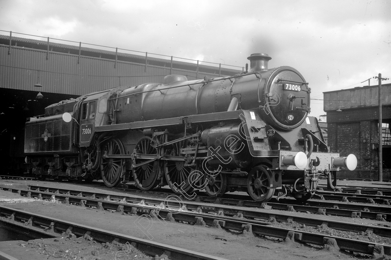 WD2403 
 ENGINE CLASS: BR 73000 4-6-0 ENGINE NUMBER: 73006 LOCATION: Patricroft DATE: 08 March 1965 COMMENTS: 
 Keywords: 08 March 1965, 73006, BR 73000 4-6-0, Cooperline, Patricroft, Steam, WD Cooper, locomotives, railway photography, trains