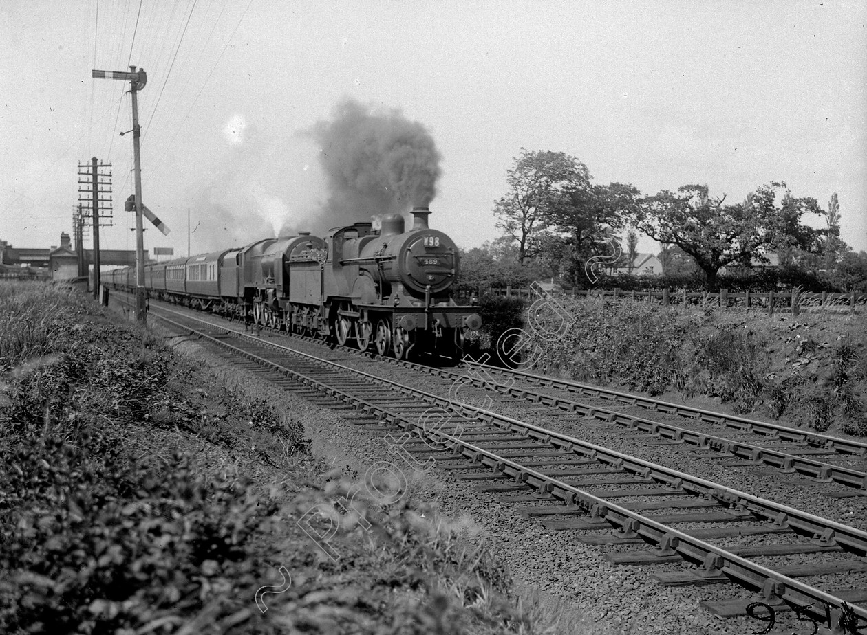 WDDH0951 
 ENGINE CLASS: Double Headed ENGINE NUMBER: 6149, 489 LOCATION: Balshaw lane DATE: 02 July 1938 COMMENTS: 
 Keywords: 02 July 1938, 489, 6149, Balshaw Lane, Cooperline, Double Headed, Steam, WD Cooper, locomotives, railway photography, trains