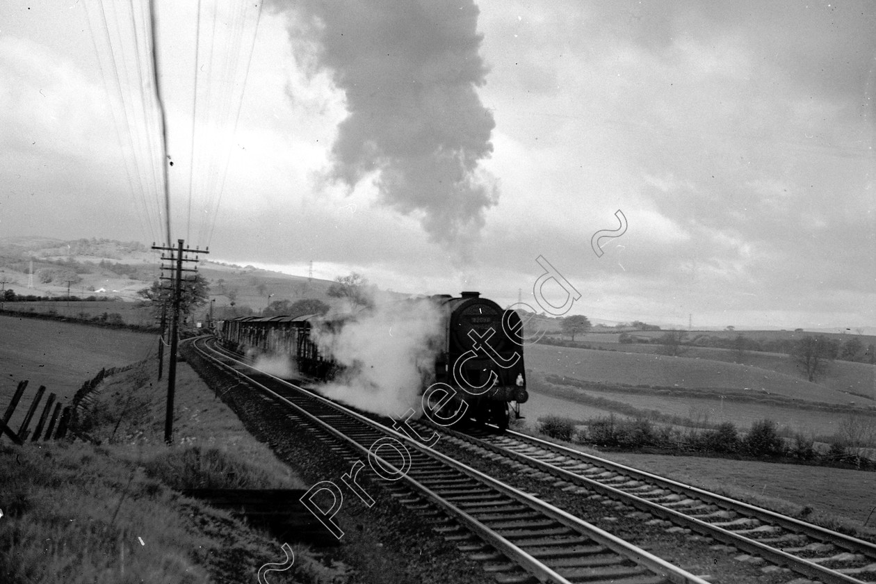 WD2648 
 ENGINE CLASS: BR Class 9 ENGINE NUMBER: 92090 LOCATION: Lambrigg DATE: 20 May 1966 COMMENTS: 
 Keywords: 20 May 1966, 92090, BR Class 9, Cooperline, Lambrigg, Steam, WD Cooper, locomotives, railway photography, trains