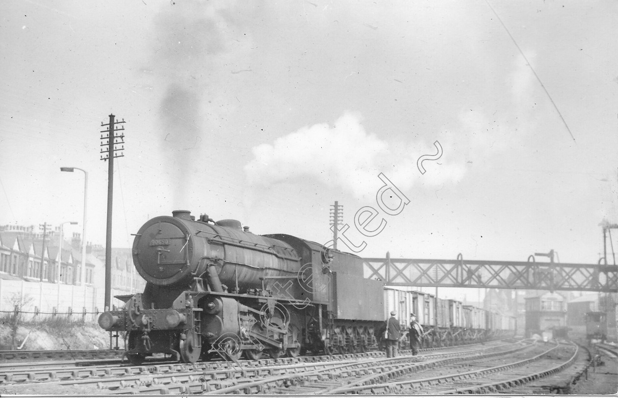 WD2532 
 ENGINE CLASS: Riddles 2-8-0 90000 ENGINE NUMBER: 90650 LOCATION: Patricroft DATE: 22 April 1960 COMMENTS: 
 Keywords: 22 April 1960, 90650, Cooperline, Patricroft, Riddles 2-8-0 90000, Steam, WD Cooper, locomotives, railway photography, trains