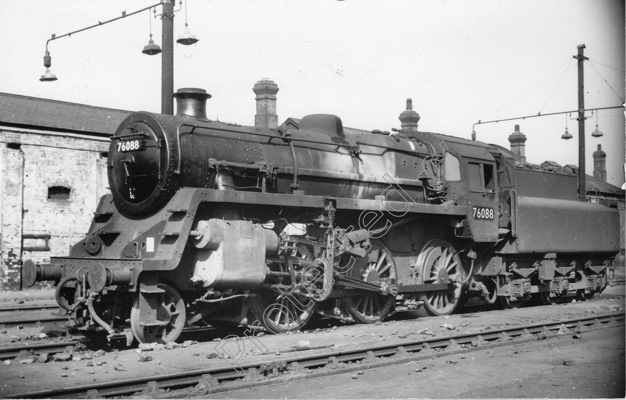 WD0697 
 ENGINE CLASS: Moguls 2-6-0 ENGINE NUMBER: 76088 LOCATION: Trafford Park DATE: 31 August 1961 COMMENTS: 
 Keywords: 31 August 1961, 76088, Cooperline, Moguls 2-6-0, Steam, Trafford Park, WD Cooper, locomotives, railway photography, trains