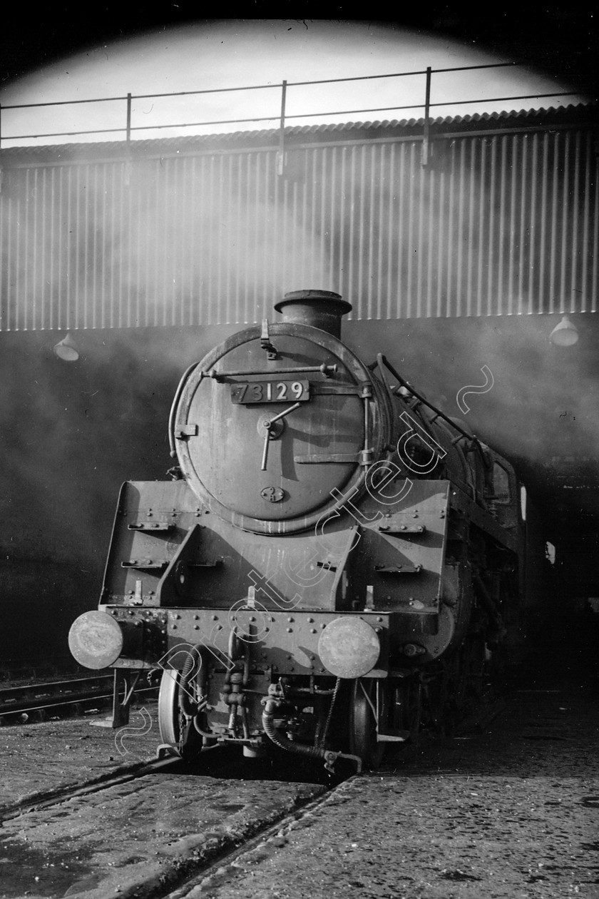 WD2437 
 ENGINE CLASS: BR 73000 4-6-0 ENGINE NUMBER: 73129 LOCATION: Patricroft DATE: 07 August 1964 COMMENTS: 
 Keywords: 07 August 1964, 73129, BR 73000 4-6-0, Cooperline, Patricroft, Steam, WD Cooper, locomotives, railway photography, trains