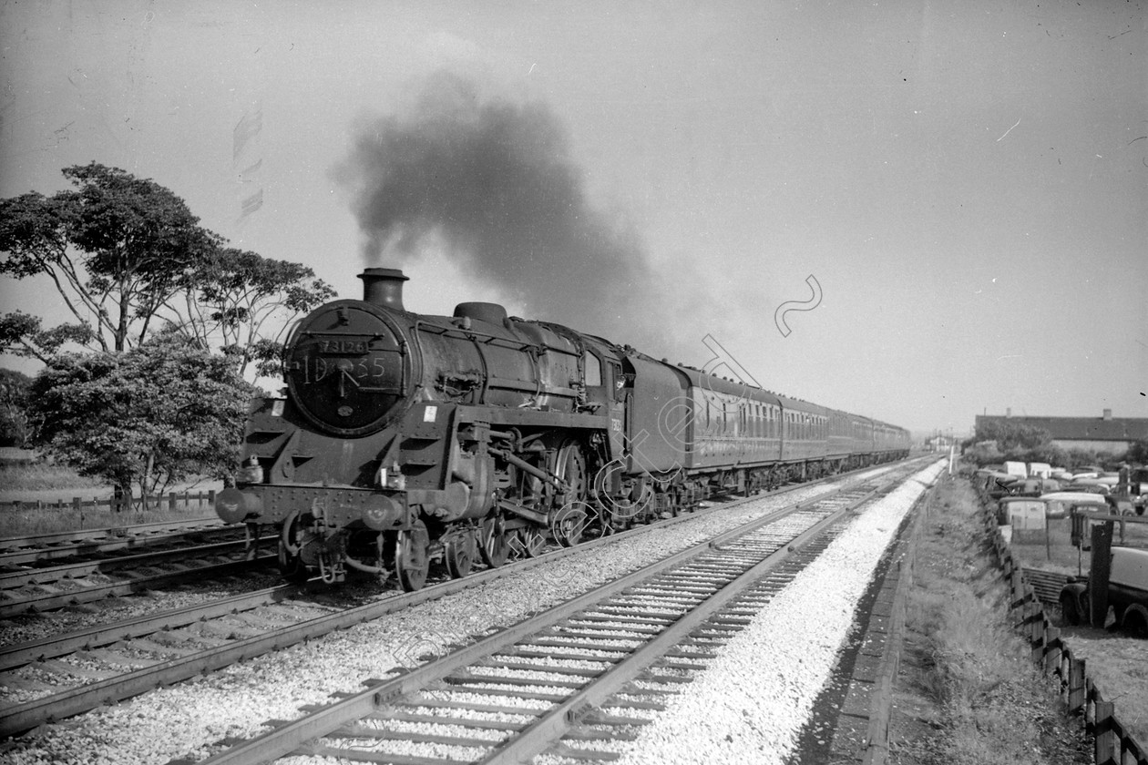 WD2431 
 ENGINE CLASS: BR 73000 4-6-0 ENGINE NUMBER: 73126 LOCATION: Winwick DATE: 23 August 1963 COMMENTS: 
 Keywords: 23 August 1963, 73126, BR 73000 4-6-0, Cooperline, Steam, WD Cooper, Winwick, locomotives, railway photography, trains