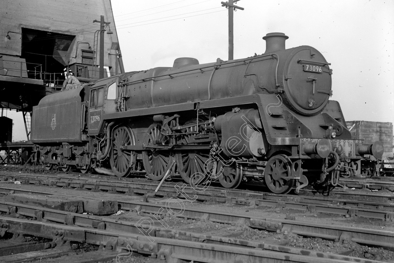 WD2425 
 ENGINE CLASS: BR 73000 4-6-0 ENGINE NUMBER: 73096 LOCATION: Patricroft DATE: 05 July 1957 COMMENTS: 
 Keywords: 05 July 1957, 73096, BR 73000 4-6-0, Cooperline, Patricroft, Steam, WD Cooper, locomotives, railway photography, trains