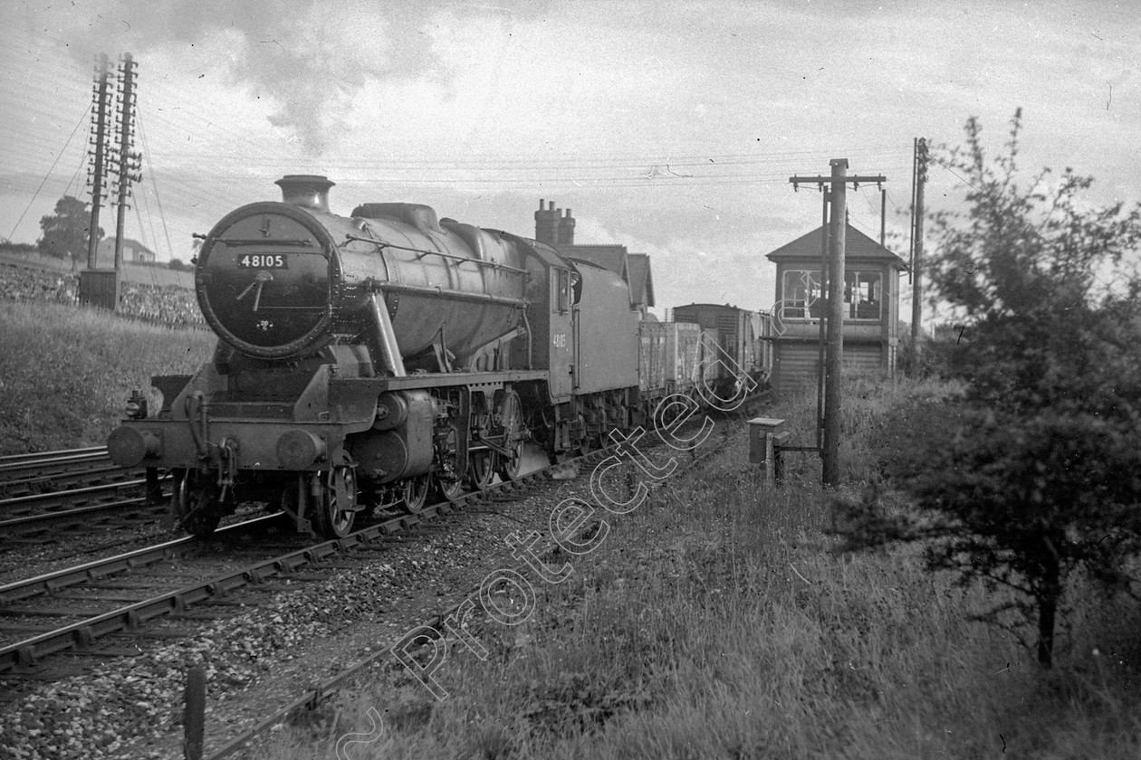 WD2012 
 ENGINE CLASS: Stanier Class 8 2-8-0 ENGINE NUMBER: 48105 LOCATION: Settle junction DATE: 00.10.1952 COMMENTS: 
 Keywords: 00.10.1952, 48105, Cooperline, Settle junction, Stanier Class 8 2-8-0, Steam, WD Cooper, locomotives, railway photography, trains