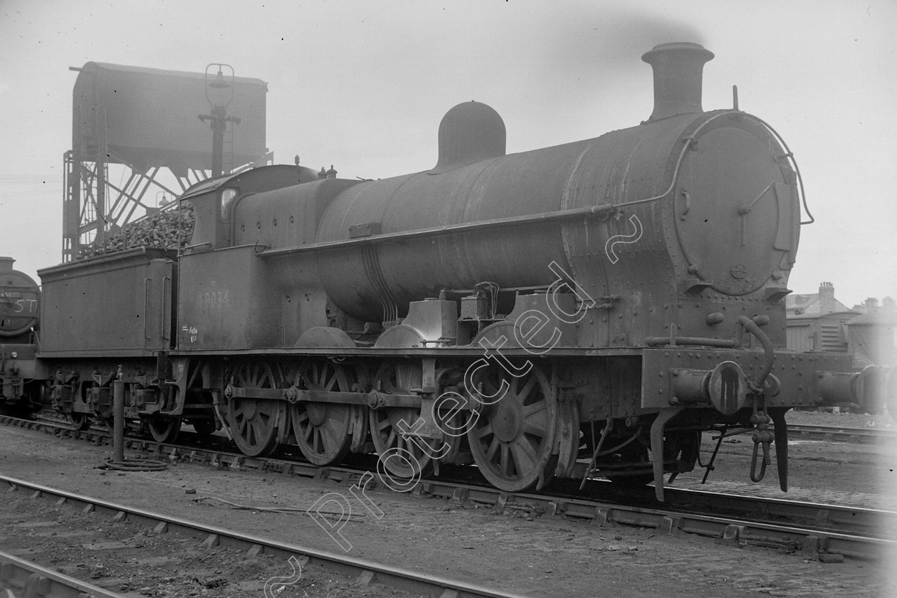 WD0951 
 ENGINE CLASS: L.N.W.R. ENGINE NUMBER: 49034 LOCATION: Patricroft DATE: 18 July 1959 COMMENTS: 
 Keywords: 18 July 1959, 49034, Cooperline, L.N.W.R., Patricroft, Steam, WD Cooper, locomotives, railway photography, trains