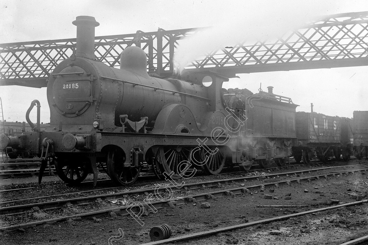 WD0556 
 ENGINE CLASS: Class 2 4-4-0 ENGINE NUMBER: 20185 LOCATION: Upperby DATE: 01 August 1939 COMMENTS: Midland 2-4-0 
 Keywords: 01 August 1939, 20185, Class 2 4-4-0, Cooperline, Midland 2-4-0, Steam, Upperby, WD Cooper, locomotives, railway photography, trains