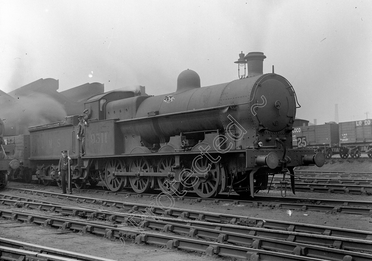 WD0979 
 ENGINE CLASS: L.N.W.R. ENGINE NUMBER: 9311 LOCATION: Preston DATE: 06 May 1939 COMMENTS: 
 Keywords: 06 May 1939, 9311, Cooperline, L.N.W.R., Preston, Steam, WD Cooper, locomotives, railway photography, trains