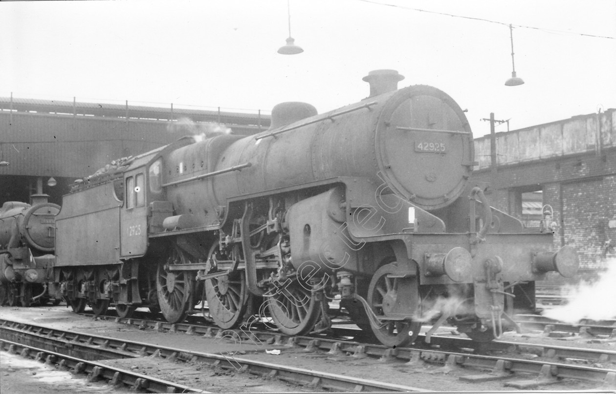 WD0662 
 ENGINE CLASS: Moguls 2-6-0 ENGINE NUMBER: 42925 LOCATION: Patricroft DATE: 24 October 1964 COMMENTS: 
 Keywords: 24 October 1964, 42925, Cooperline, Moguls 2-6-0, Patricroft, Steam, WD Cooper, locomotives, railway photography, trains