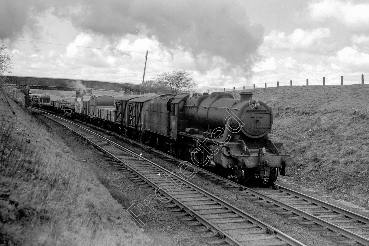 WD2027 
 ENGINE CLASS: Stanier Class 8 2-8-0 ENGINE NUMBER: 48294 LOCATION: Grayrigg DATE: 01 May 1963 COMMENTS: 
 Keywords: 01 May 1963, 48294, Cooperline, Grayrigg, Stanier Class 8 2-8-0, Steam, WD Cooper, locomotives, railway photography, trains