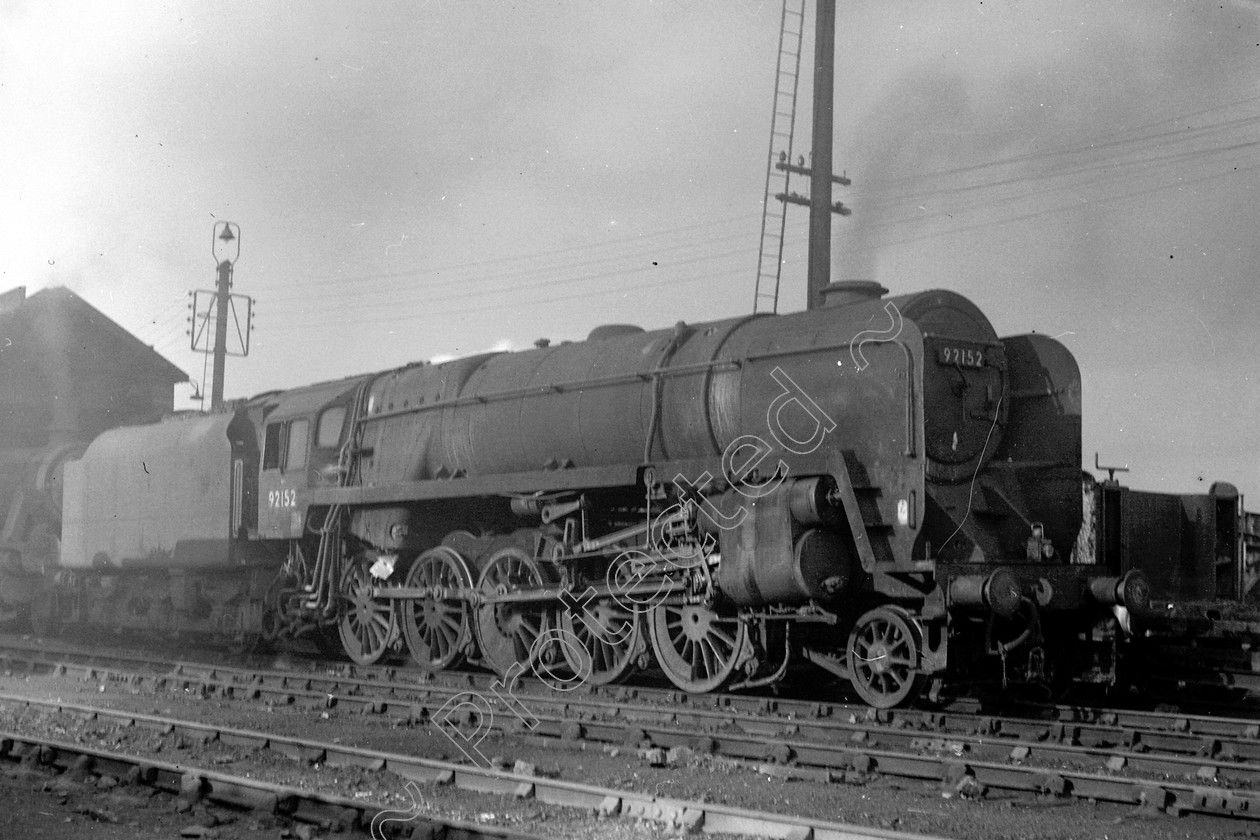 WD2665 
 ENGINE CLASS: BR Class 9 ENGINE NUMBER: 92152 LOCATION: Patricroft DATE: 17 October 1966 COMMENTS: 
 Keywords: 17 October 1966, 92152, BR Class 9, Cooperline, Patricroft, Steam, WD Cooper, locomotives, railway photography, trains