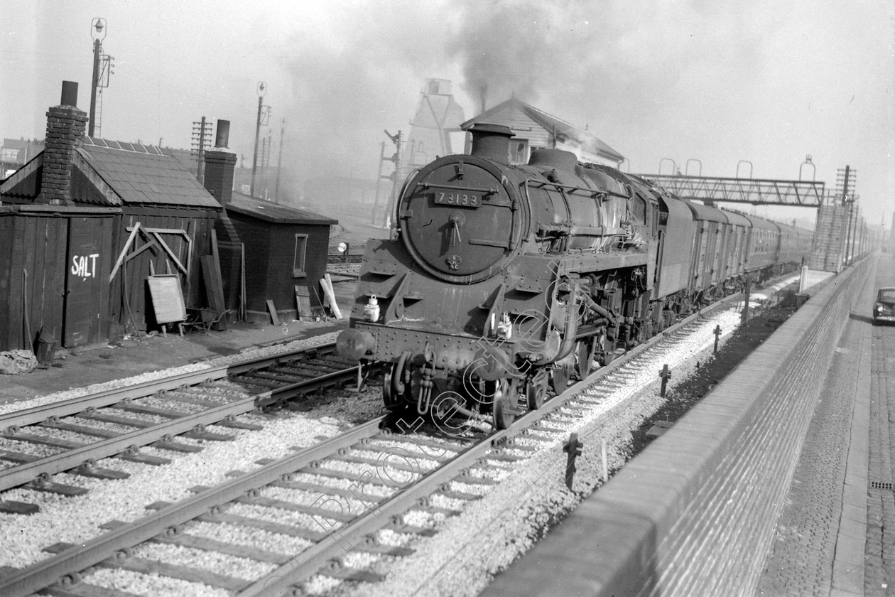 WD2445 
 ENGINE CLASS: BR 73000 4-6-0 ENGINE NUMBER: 73133 LOCATION: Patricroft DATE: 08 March 1964 COMMENTS: 
 Keywords: 08 March 1964, 73133, BR 73000 4-6-0, Cooperline, Patricroft, Steam, WD Cooper, locomotives, railway photography, trains