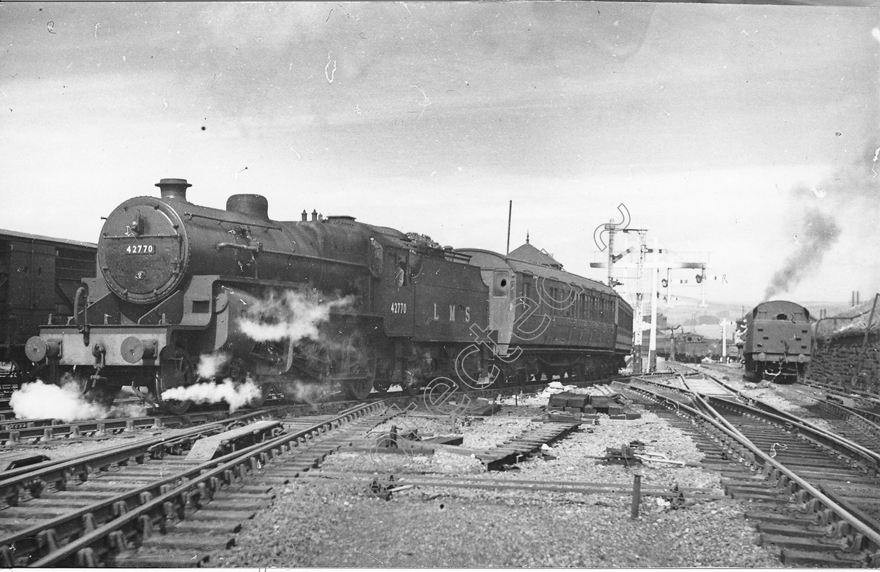 WD0630 
 ENGINE CLASS: Moguls 2-6-0 ENGINE NUMBER: 42770 LOCATION: Hellifield DATE: 00.08.1949 COMMENTS: 
 Keywords: 00.08.1949, 42770, Cooperline, Hellifield, Moguls 2-6-0, Steam, WD Cooper, locomotives, railway photography, trains