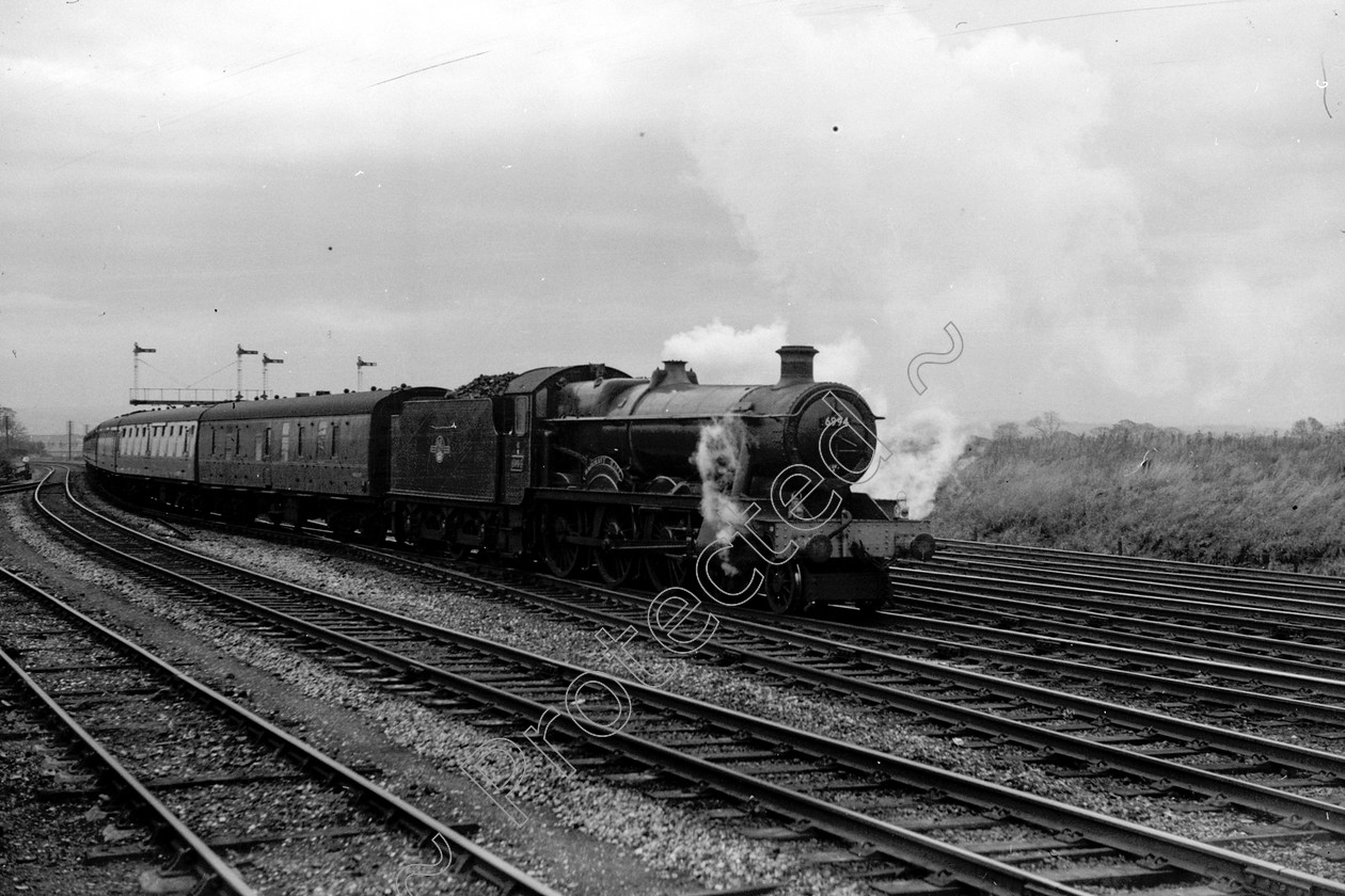 WD2826 
 ENGINE CLASS: GWR ENGINE NUMBER: 6994 LOCATION: near Chester DATE: 19 October 1963 COMMENTS: 
 Keywords: 19 October 1963, 6994, Cooperline, GWR, Near Chester, Steam, WD Cooper, locomotives, railway photography, trains