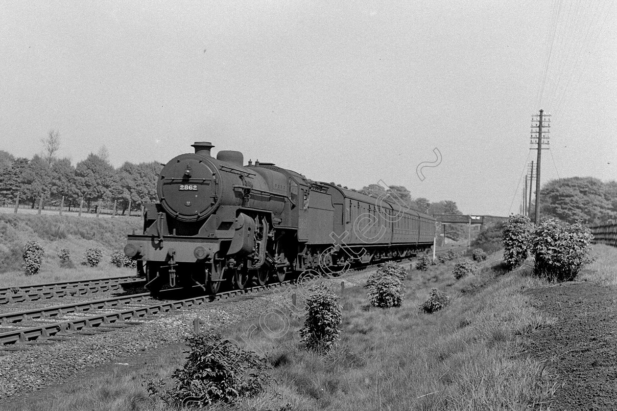 WD0605 
 ENGINE CLASS: Moguls 2-6-0 ENGINE NUMBER: 2862 LOCATION: Ellenbrook DATE: 12 May 1945 COMMENTS: 
 Keywords: 12 May 1945, 2862, Cooperline, Ellenbrook, Moguls 2-6-0, Steam, WD Cooper, locomotives, railway photography, trains