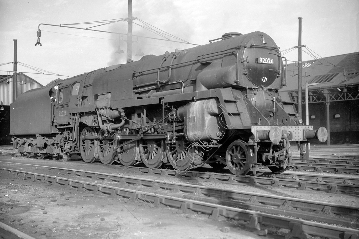 WD2622 
 ENGINE CLASS: BR Class 9 ENGINE NUMBER: 92026 LOCATION: Trafford Park DATE: 00.06.1958 COMMENTS: 
 Keywords: 00.06.1958, 92026, BR Class 9, Cooperline, Steam, Trafford Park, WD Cooper, locomotives, railway photography, trains