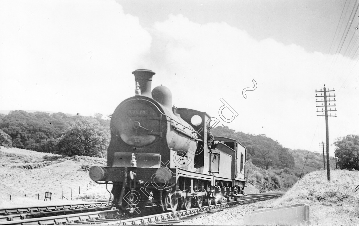 WD0792 
 ENGINE CLASS: Scottish ENGINE NUMBER: 57570 LOCATION: DATE: 10 August 1950 COMMENTS: 
 Keywords: 10 August 1950, 57570, Cooperline, Scottish, Steam, WD Cooper, locomotives, railway photography, trains