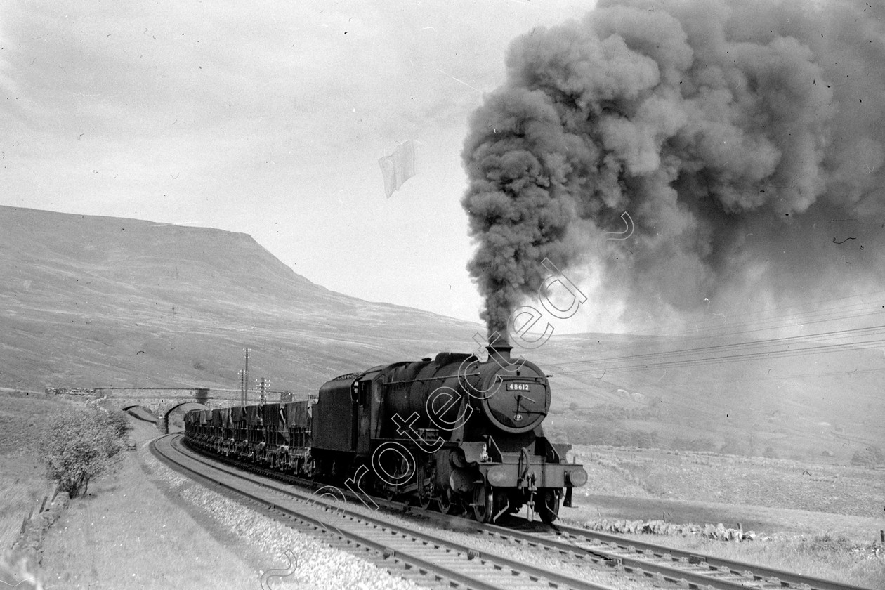 WD2065 
 ENGINE CLASS: Stanier Class 8 2-8-0 ENGINE NUMBER: 48612 LOCATION: Aisgill DATE: 13 May 1961 COMMENTS: 
 Keywords: 13 May 1961, 48612, Aisgill, Cooperline, Stanier Class 8 2-8-0, Steam, WD Cooper, locomotives, railway photography, trains