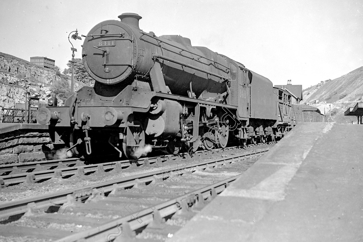 WD2043 
 ENGINE CLASS: Stanier Class 8 2-8-0 ENGINE NUMBER: 8411 LOCATION: Millarsdale DATE: 00.05.1948 COMMENTS: 
 Keywords: 00.05.1948, 8411, Cooperline, Millarsdale, Stanier Class 8 2-8-0, Steam, WD Cooper, locomotives, railway photography, trains