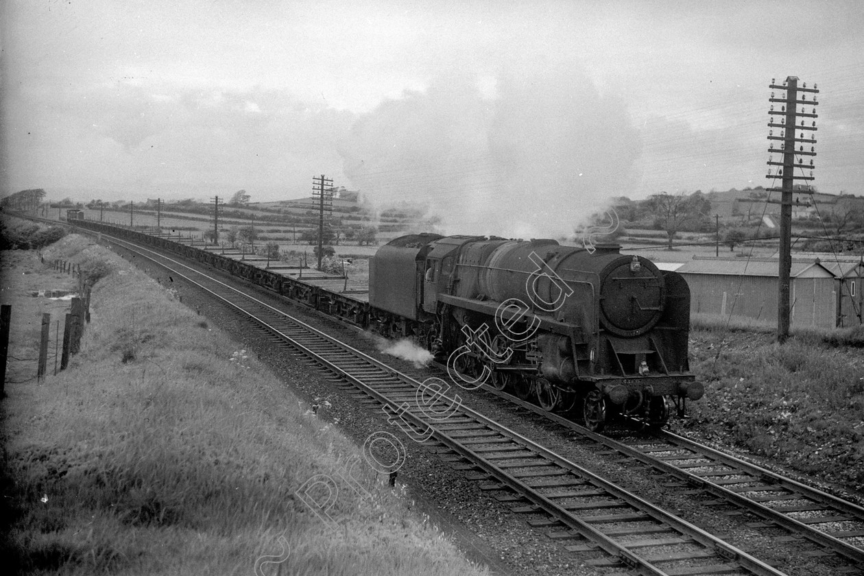 WD2633 
 ENGINE CLASS: BR Class 9 ENGINE NUMBER: 92052 LOCATION: Lancaster DATE: 18 May 1965 COMMENTS: 
 Keywords: 18 May 1965, 92052, BR Class 9, Cooperline, Lancaster, Steam, WD Cooper, locomotives, railway photography, trains