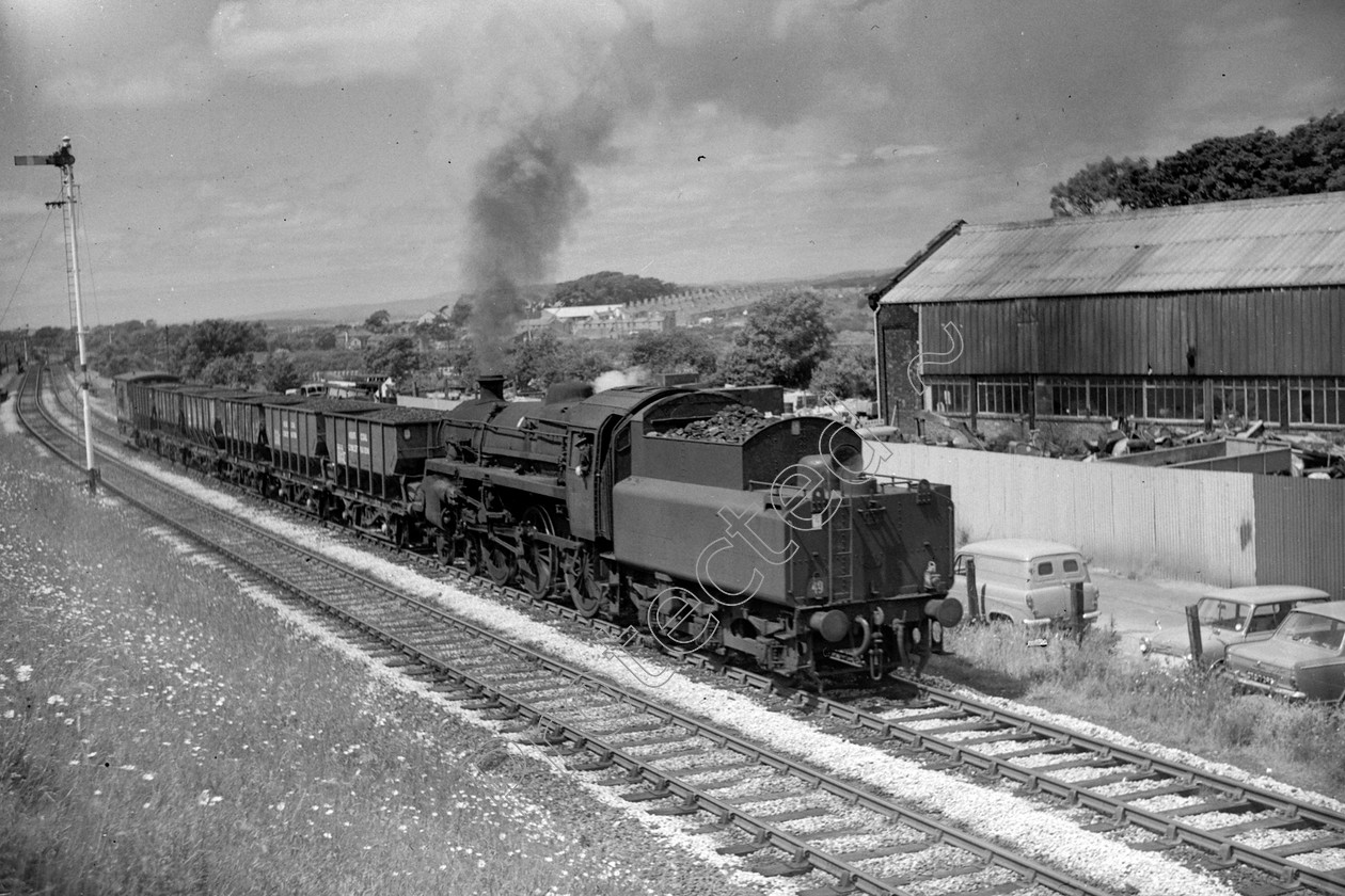 WD2487 
 ENGINE CLASS: BR 75000 4-6-0 ENGINE NUMBER: 75040 LOCATION: Carnforth DATE: 30 June 1967 COMMENTS: 
 Keywords: 30 June 1967, 75040, BR 75000 4-6-0, Carnforth, Cooperline, Steam, WD Cooper, locomotives, railway photography, trains