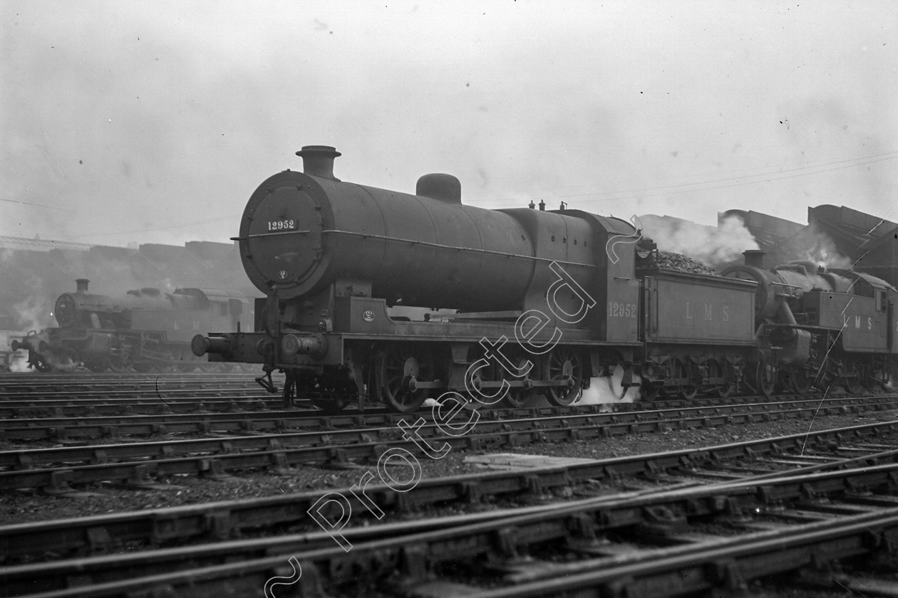 WD0860 
 ENGINE CLASS: Lancashire and Yorkshire ENGINE NUMBER: 12952 LOCATION: Newton Heath DATE: 01 June 1948 COMMENTS: 
 Keywords: 01 June 1948, 12952, Cooperline, Lancashire and Yorkshire, Newton Heath, Steam, WD Cooper, locomotives, railway photography, trains