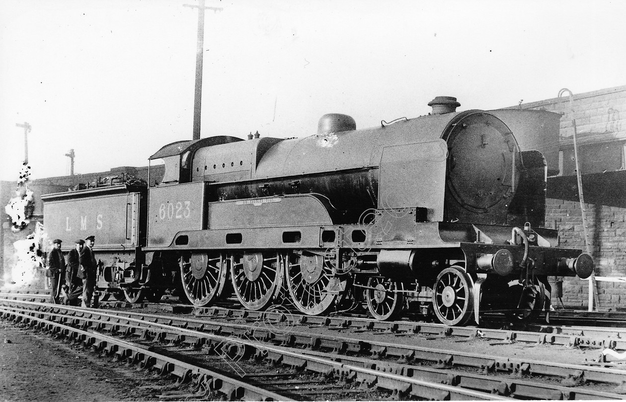 WD0948 
 ENGINE CLASS: L.N.W.R. ENGINE NUMBER: 6023 LOCATION: Edgehill DATE: 07 November 1938 COMMENTS: 
 Keywords: 07 November 1938, 6023, Cooperline, Edgehill, L.N.W.R., Steam, WD Cooper, locomotives, railway photography, trains