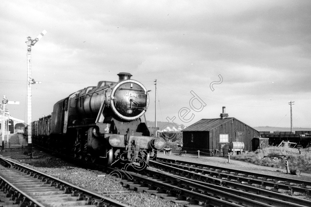 WD2038 
 ENGINE CLASS: Stanier Class 8 2-8-0 ENGINE NUMBER: 48352 LOCATION: Hellifield DATE: 25 August 1962 COMMENTS: 
 Keywords: 25 August 1962, 48352, Cooperline, Hellifield, Stanier Class 8 2-8-0, Steam, WD Cooper, locomotives, railway photography, trains