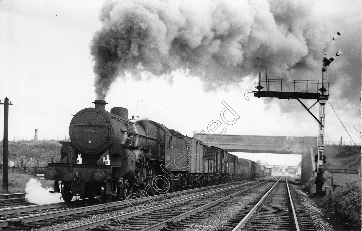 WD0627 
 ENGINE CLASS: Moguls 2-6-0 ENGINE NUMBER: 42765 LOCATION: Leyland DATE: 20 June 1964 COMMENTS: 
 Keywords: 20 June 1964, 42765, Cooperline, Leyland, Moguls 2-6-0, Steam, WD Cooper, locomotives, railway photography, trains