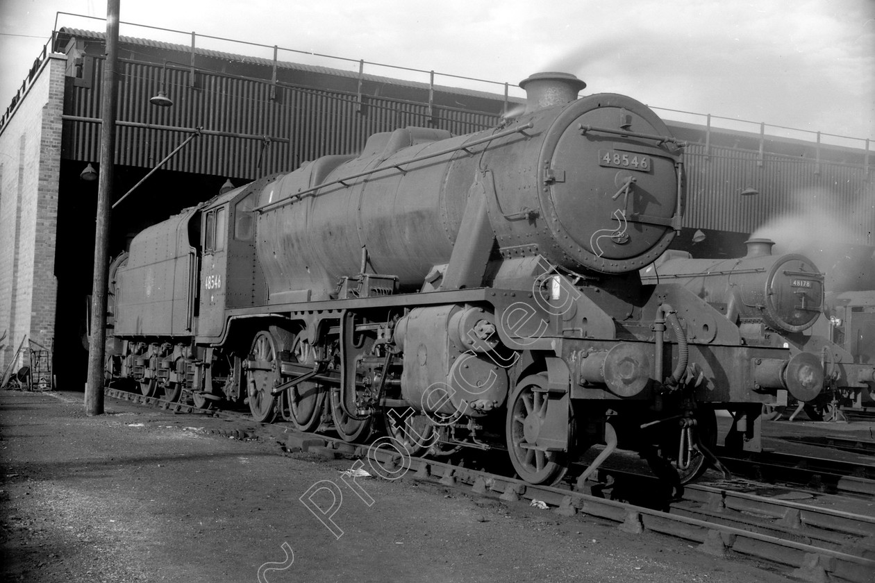 WD2061 
 ENGINE CLASS: Stanier Class 8 2-8-0 ENGINE NUMBER: 48546 LOCATION: Patricroft DATE: 00.07.1963 COMMENTS: 
 Keywords: 00.07.1963, 48546, Cooperline, Patricroft, Stanier Class 8 2-8-0, Steam, WD Cooper, locomotives, railway photography, trains