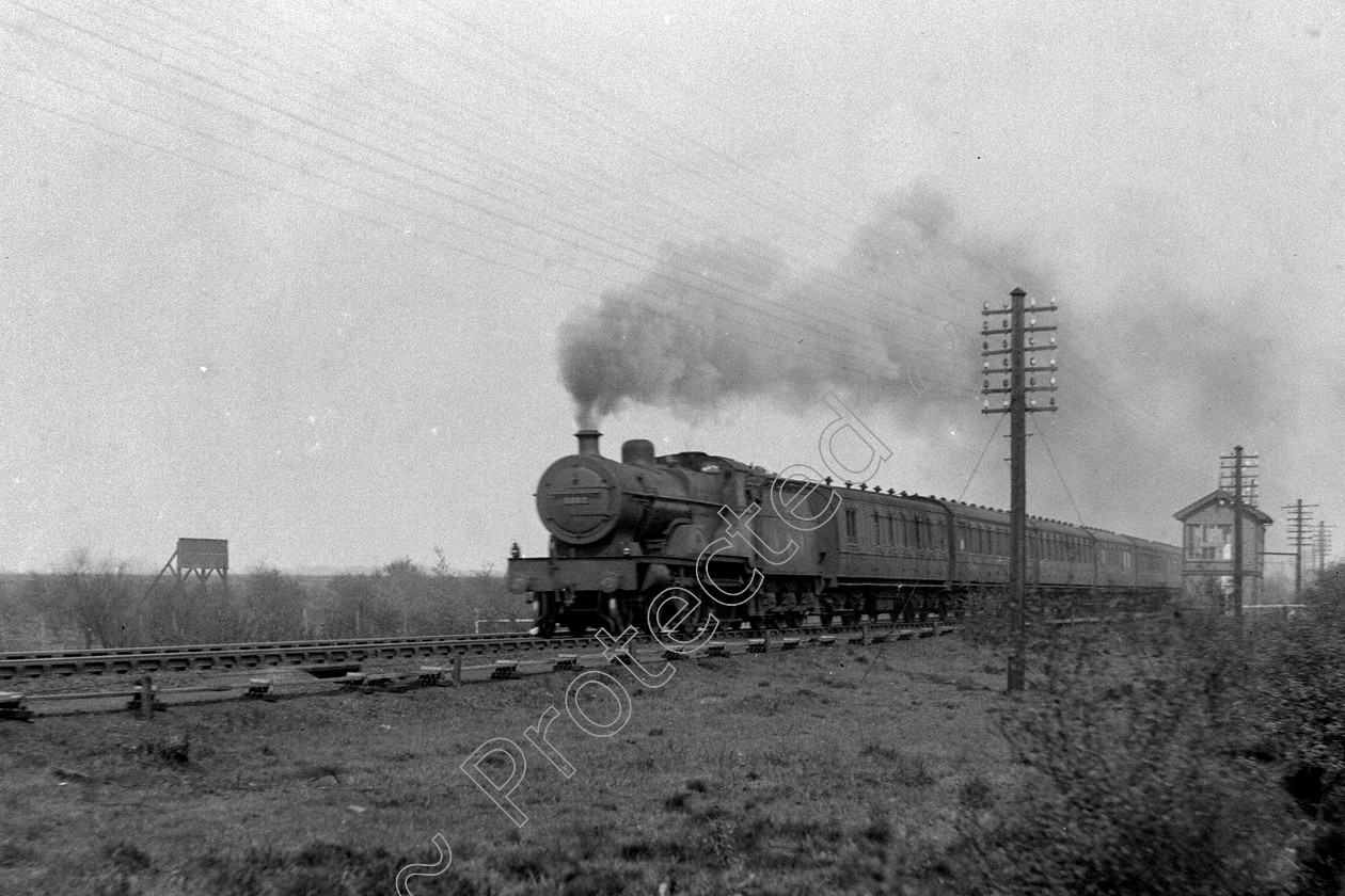 WD0535 
 ENGINE CLASS: Midland Compounds ENGINE NUMBER: 1112 LOCATION: Chat Moss DATE: 09 May 1942 COMMENTS: 
 Keywords: 09 May 1942, 1112, Chat Moss, Cooperline, Midland Compounds, Steam, WD Cooper, locomotives, railway photography, trains