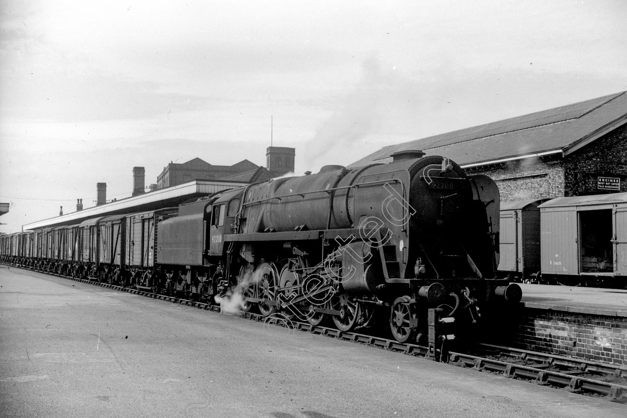 WD2681 
 ENGINE CLASS: BR Class 9 ENGINE NUMBER: 92208 LOCATION: Patricroft DATE: 12 May 1964 COMMENTS: 
 Keywords: 12 May 1964, 92208, BR Class 9, Cooperline, Patricroft, Steam, WD Cooper, locomotives, railway photography, trains